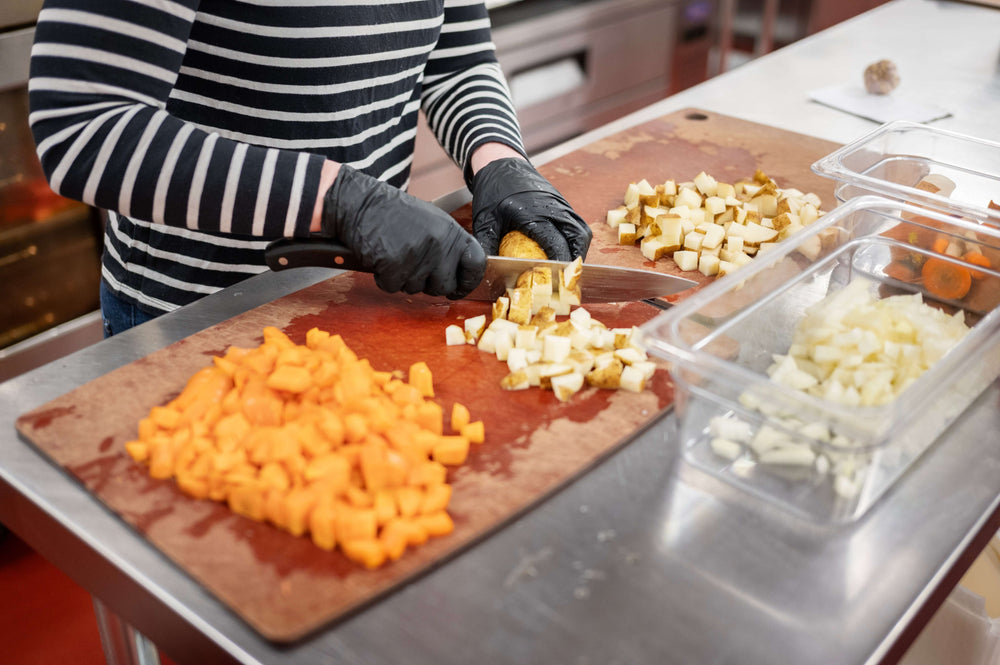 Chef Erin Palombo using the Epicurean Kitchen Series Cutting Board