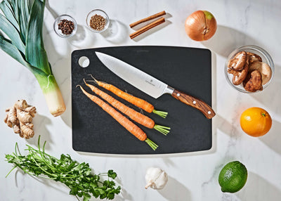 Epicurean Kitchen Series in Slate with fruits and vegetables ready to be sliced with a Victorinox Chef's Knife