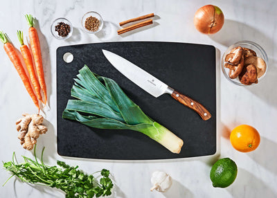 Epicurean Kitchen Series Cutting Board in Slate with fruits and vegetables ready to be sliced with a Victorinox Chef's Knife
