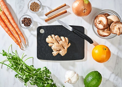 Epicurean Kitchen Series Cutting Board with fruits and vegetables ready to be sliced with a Victorinox Swiss Classic Paring Knife