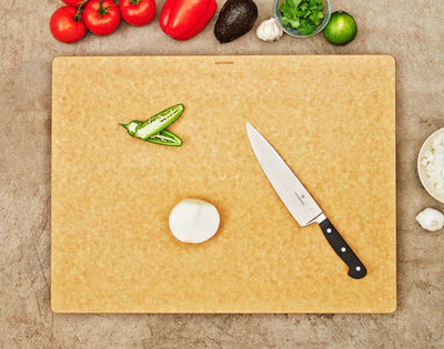The Big Block Board in Natural with a Slate Cascade being used to slice fresh produce.